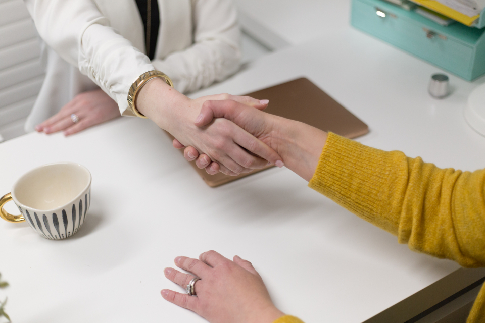 Handshake closing a language training vendor agreement